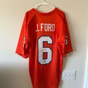 NCAA Orange Jersey with White Accents